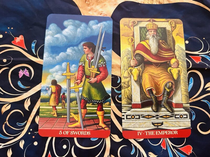 Five of Swords and The Emperor photo by Tarot Institute.