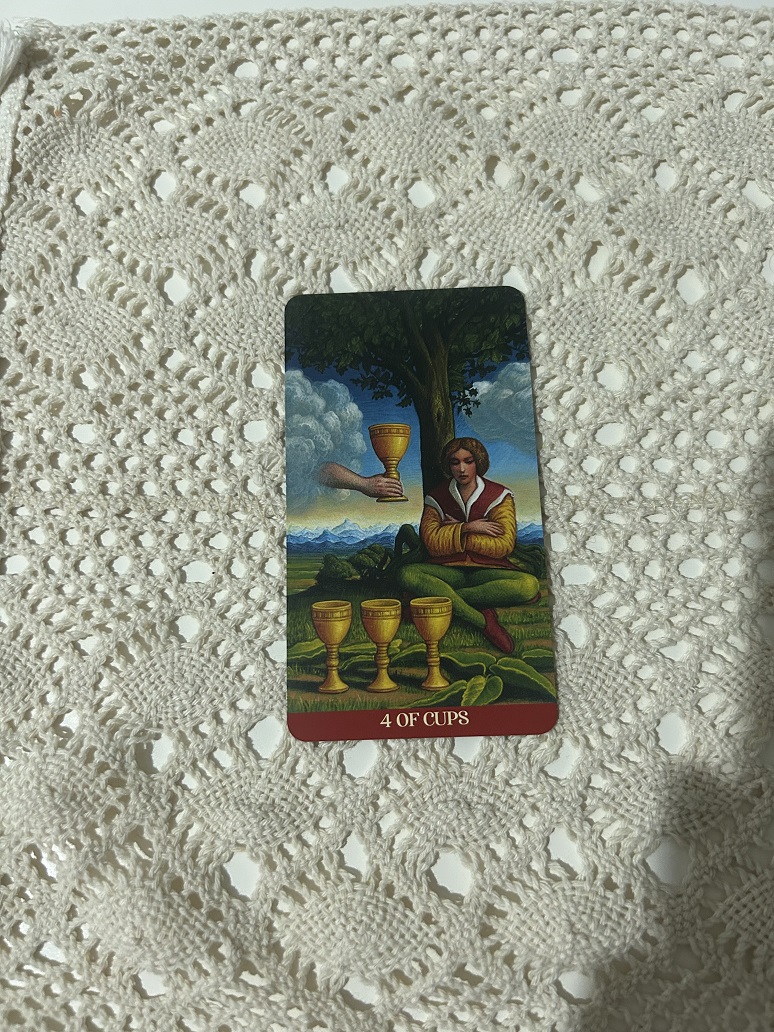 Four of Cups Tarot Card Photo by Tarot Institute 2