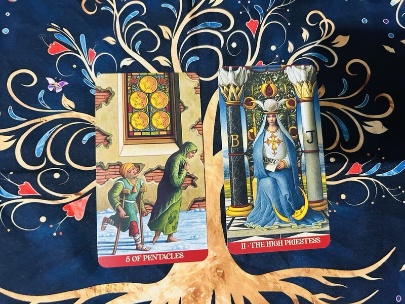 The Five of Pentacles and The High Priestess photo by Tarot Institute.