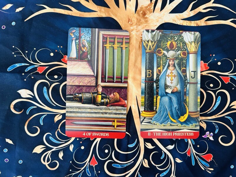 The Four of Swords and The High Priestess photo by Tarot Institute.