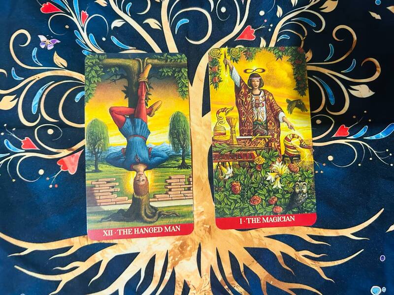 The Hanged Man and The Magician photo by Tarot Institute.