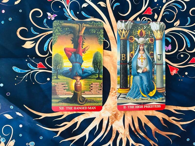 The Hanged Man and the High Priestess photo by Tarot Institute