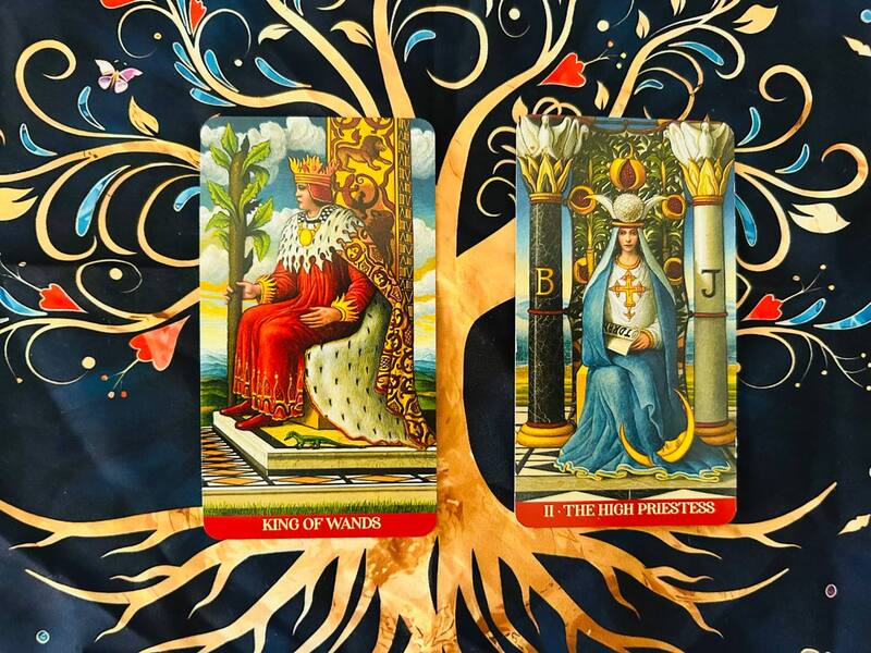 The King of Wands and the High Priestess photo by Tarot Institute.