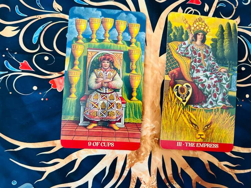 he Nine of Cups and The Empress photo by Tarot Institute