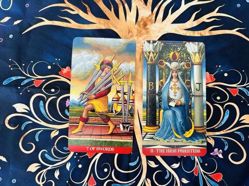 The Seven of Swords and The High Priestess photo by Tarot Institute.