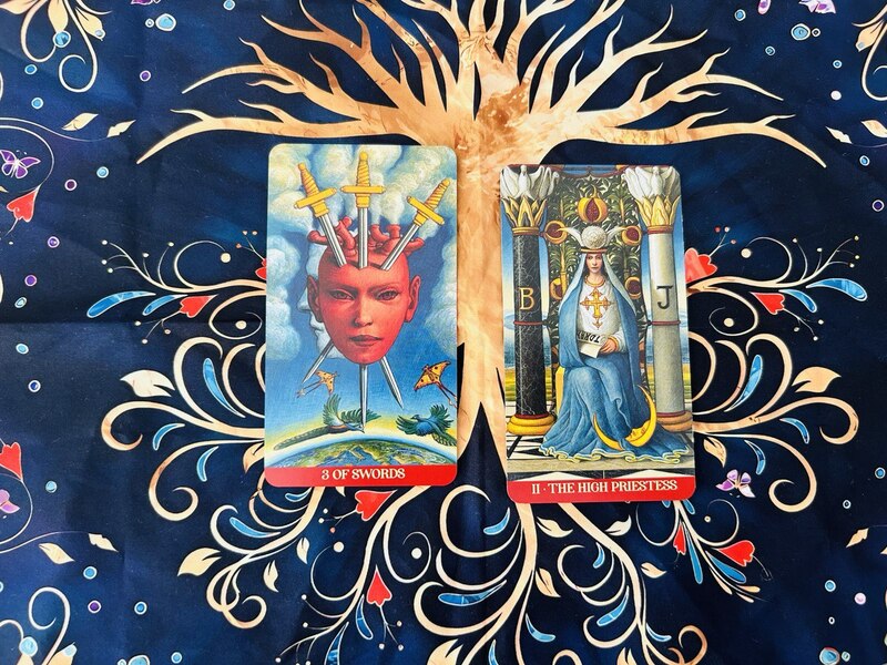 The Three of Swords and The High Priestess photo by Tarot Institute.