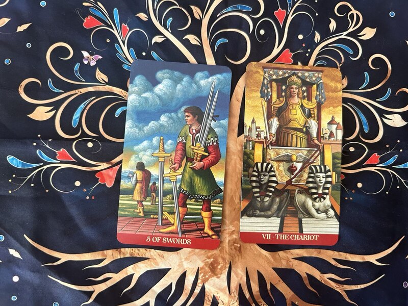 Five of Swords and The Chariot photo by Tarot Institute