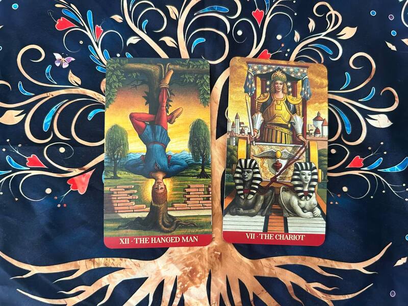 The Hanged Man and The Chariot photo by Tarot Institute