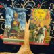 Four of Pentacles and The Sun photo by Tarot Institute
