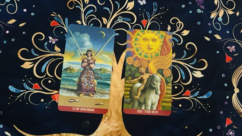Two of Swords and The Sun photo by Tarot Institute.