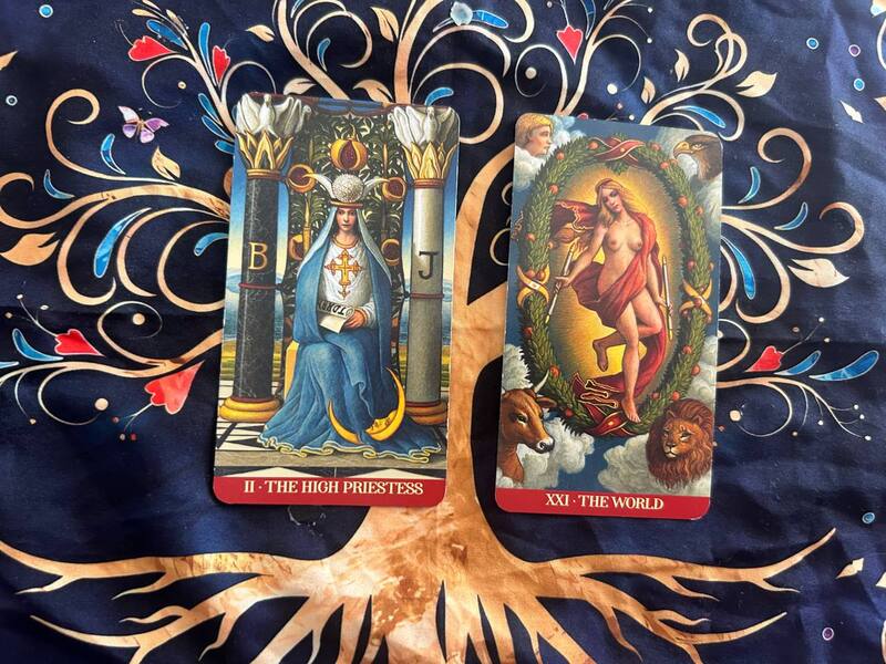 The High Priestess and The World photo by Tarot Institute.